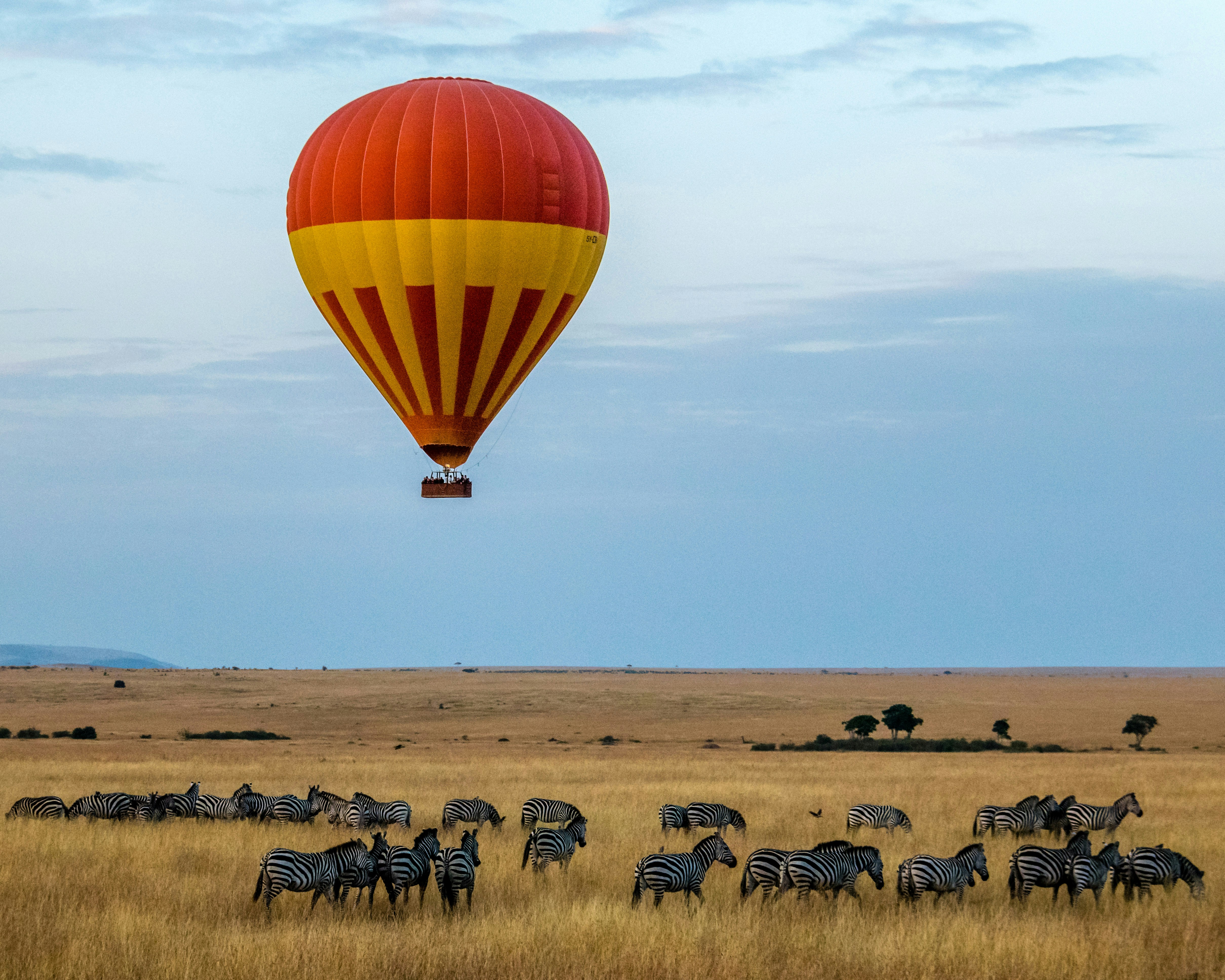 Hot air balloon over a dry landscape