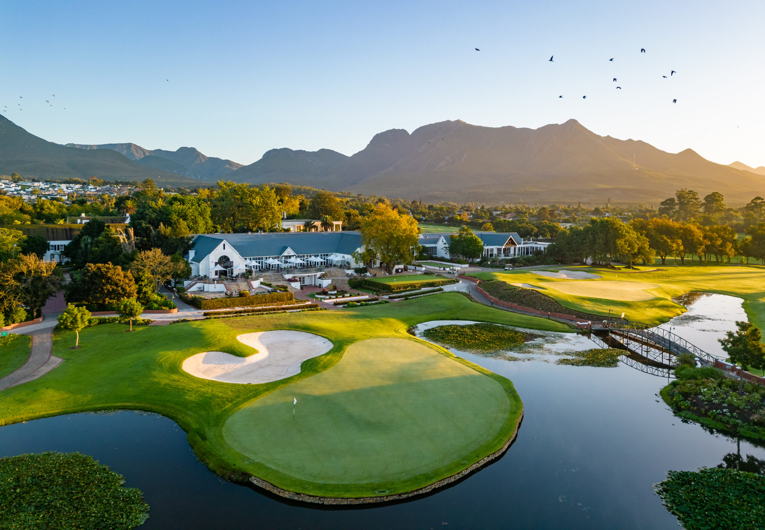 Golfers on a sunny golf course